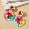 Aretes de isla hechos a mano de girasol de rafia y pasto, aretes de flores grandes exagerados de personalidad junto al mar, venta al por mayor de aretes