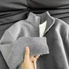 Suéter versátil de nuevo diseño para hombre, cárdigan de estilo casual, chaqueta con cremallera y cuello alto, abrigo de punto para otoño e invierno