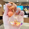 Desenho animado de areia movediça urso dos sonhos menina chaveiro cor de leite em pó boneca fofa pingente de bolsa casal presente pequeno atacado