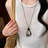 Collar con Colgante de Anillo Redondo Hueco Retro Estampado de Leopardo Ámbar para Mujer Diseño de Nicho Colgante para el Cuello Nuevos Accesorios Verano 2026-