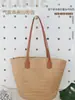Bolsas tejidas de paja personalizadas para mujer 2026 Nuevo bolso de hombro de verano para viajes de vacaciones Bolso tote de moda para el trabajo
