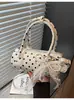 Transfronterizo 2026 Modelo Nuevo Exquisita Versátil Moderna de Nicho Bolso de Lunares Bolso Cruzado para Mujer Bolso de Mano Popular Bolso Cilíndrico