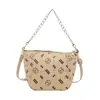 Bolso Cubo Texturizado con Cadena Portátil al por Mayor Bolso de Mujer Verano 2025 Nuevo Lujo Accesible Bolso de Hombro Estampado Bolso Cruzado para el Trabajo