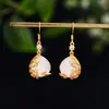 Diseño estilo chino corte retro Pavo real Hetian jade pendientes pendientes muestran cara delgada suministro ancla Generación en vivo