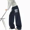 Pantalones deportivos azules con estampado de letras, estilo hombre, pantalones de pierna recta para hip-hop callejero americano, con un diseño de pierna ancha, fluido y curvo