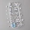 Decoraciones para Uñas Artísticas Iridiscentes Transparente Hielo de 12 Compartimentos Transfronterizas, Estrella de Mar Shell Azul Perlado Dibujos Animados Árbol de Coco Decoraciones DIY para Uñas