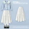 Nueva colección de primavera y otoño estilo coreano: Sudadera preppy con cuello azul marino y falda dulce y linda con lazo, un conjunto de dos piezas para niñas
