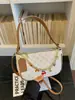 Bolso de nicho para mujer súper popular, nuevo bolso cruzado de moda de verano 2026 con un toque elegante de alta gama, bolso de hombro único para debajo del brazo