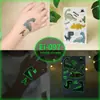 Pegatinas de Tatuaje de Dibujos Animados para Niños, Mundo de Dinosaurios Luminoso, Pegatinas Temporales Impermeables para Cara de Niños y Niñas, Stock Listo Transfronterizo