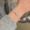 Pulsera Minimalista de Plata Cadena Hueso de Serpiente con Lazo para Mujer 2024 Nuevo Nicho Pulsera con Sensación de Alta Gama Joyería de Viento Frío