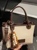 Bolsa Casual de Nicho Feminina Grande Capacidade Outono 2025 Nova Bolsa de Balde Simples Bolsa Transversal da Moda para Senhora