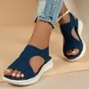 Sandálias de malha fly-knit de tamanho grande para comércio exterior para mulheres, novo modelo de verão 2025, sandálias esportivas planas casuais versáteis e respiráveis