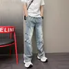 2026 Original Más Vendido Invierno Tendencia Marca Versátil Lavado Holgado Harem Recto Azul Jeans Casuales para Hombre