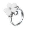 Anillo Elegante para Mujer Estilo Chanel Flor de Cinco Hojas, Nuevo Modelo Transfronterizo con Piedra Ojo de Gato Giratoria, Joyería de Diseño Exquisito