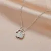 Chapado en oro real cadena para clavícula de temperamento diseño de nicho femenino sentido de la moda llave candado de larga vida collar personalidad cadena para el cuello simple joyería