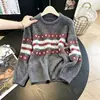 Suéter Fair Isle Mujer 2026 Otoño Invierno Nuevo Perezoso Sensación de Alta Gama Tejido Amarillo Estilo Coreano Suelto Top de Lana