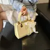 Bolsa Quadrada Pequena Portátil Mais Vendida Transfronteiriça Feminina 2025 Nova Moda de Nicho Bolsa de Ombro Bolsa Transversal de Alta Qualidade Versátil