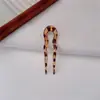 Pasador de pelo en forma de U con estampado de leopardo en color gelatina para mujer, simple y versátil para peinar la parte posterior de la cabeza, con un toque de alta gama, accesorio para el cabello de pasador ondulado