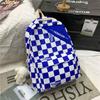 Mochila Mochila para Alunos do Ensino Fundamental e Médio 2022 Novo Estilo Xadrez Casual Costas Duplas Masculinas Estilo Coreano Estilo Universitário Bolsa Feminina Moderna para Mulheres