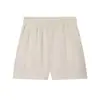 Conjunto de ropa de mujer transfronteriza estilo europeo y americano, moderno chaleco de lino cruzado con cinturón y pantalones cortos casuales con cintura elástica