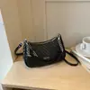 Bolsa de hombro minimalista de moda estilo coreano Shuai Mi Jia 2026 nueva vintage de lujo ligero nicho bolsa de hombro bolsa cruzada para el día a día