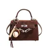 Bolsas Retro de Gamuza de Nicho Otoño e Invierno 2026 Nueva Moda Bolso Cruzado Versátil Bolso de Hombro Único Bolso Kelly