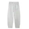 Pantalones deportivos joggers de bajo curvo para otoño e invierno para hombre, corte holgado, marca de moda, pantalones casuales tipo harén de color liso para hombre de primavera
