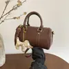 Bolsa de Bolos de Mano Retro de Gama Alta para Mujer Otoño e Invierno 2026 Bolso de Hombro Simple y de Moda Nuevo Bolso Cruzado Versátil