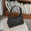 Bolsa Feminina Nova Primavera 2026 Estilo Coreano Nicho Casual Bolsa de Ombro de Mão Moda Strass Elegante Bolsa de Braço