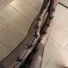 Lazo de Seda Negro Medias de Malla Hueca Negras y Blancas Piernas Hermosas Deseo Puro Japonés Medias Sexy Encaje