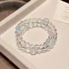 A pulseira de cristal de laço duplo original de cristal branco natural e água-marinha da Mingtai Jewelry é refrescante e versátil para o verão, com um design fresco e simples.