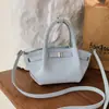 Bolsa balde tendência de nicho para carregar na mão, nova moda primavera 2026 bolsa de ombro estilo coreano, bolsa transversal de alto valor para mulheres