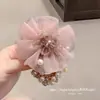 2026 Hilo Brillante Exquisito Lujo Ligero Pedrería Perla de Imitación Camelia Goma para el Cabello para Mujer Cuerda para el Cabello de Alta Elasticidad para la Parte Posterior de la Cabeza