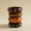 Pulseira geométrica de madeira e metal com rebites em formato de estrela, estilo étnico europeu e americano, acessório feminino versátil minimalista de nicho