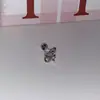 Brincos de luxo com micro-zircônias e pequenas lâmpadas brilhantes, modelo 2026, com rosca coclear e base plana.