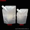 En stock bolsa de papel kraft con boquilla de succión abatible bolsa de papel y plástico para champú químico diario bolsa de embalaje de viaje bolsa de agua plegable portátil