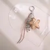 Llavero de pentagrama de colores pastel, lindo y versátil, adecuado para colgar en mochilas, cadenas de teléfono y bolsos, nuevo accesorio de moda