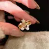 Novo anel de pérola com estrelas brilhantes de luxo da moda Anel Xinghe design de nicho feminino com sensação retrô francesa atacado