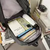 Mochila Nueva Casual Transfronteriza de Gran Capacidad Ligera, Mismo Estilo Outdoor Impermeable de Nylon para Estudiantes Hombres y Mujeres