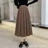 Falda plisada de longitud media para mujer otoño e invierno Nuevo estilo Ballet Americano cintura alta elástica sexy para commuting falda línea A