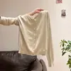 Cárdigan de punto de cuello redondo y manga larga de color albaricoque estilo coreano para mujer, nueva chaqueta holgada de corte slim para otoño e invierno 2026