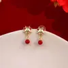 Pendientes Estilo Chino Año Zodiacal Festivo Aguja de Plata, Carácter de Fortuna Rojo Corazón Hueco Despertar del León Pendientes Asimétricos con Electrochapado