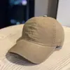Gorra de béisbol japonesa lavada simple con letras pequeñas hace que la cara se vea más pequeña versátil callejera visera curva gorra de papá sombrero de sol para mujer