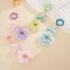 Colgante llavero de lazo bañado fresco y versátil, accesorio para bolso de flor de perla tejida a mano inspirado en la dopamina