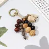Nuevo Colgante de Bolso de Cáscara de Fruta Natural Estilo Chino Carrillón de Viento Tejido a Mano Campana Colgante de Sanación Sonora Colgante de Planta/Fruta Colgante para Coche