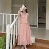 Chal sin mangas con lazo tridimensional de la primavera de 2026 Vestido falso de dos piezas