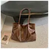 Bolsa de mano lisa transfronteriza, nueva colección otoño/invierno, cuero encerado, casual y elegante para ir al trabajo, bolso de hombro retro color marrón Melard