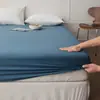 Sábana bajera de color sólido de lujo ligero de alta gama estilo hotel, 100S de algodón de fibra larga, pieza única, funda de cama de satén de algodón puro para dormir directamente sobre el colchón
