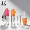 Pedido Jinze: Forma Redonda Irregular, Sin Cadena/Se Puede Enganchar con Cadena, Moldeado por Inyección, Tubo para Brillo de Labios con Varilla de Pincel Gruesa, Material de Empaque