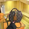 Bolsas Transfronterizas Vintage para Mujer 2026 Nuevo Bolso de Mano con Pañuelo de Seda Bolso Cruzado Popular Europeo y Americano Cubo de la Fortuna Bolso Pequeño